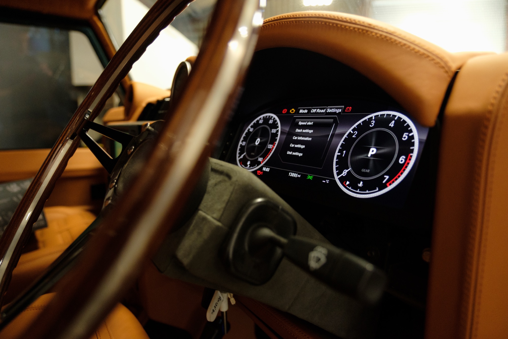 Defender LS wooden steering wheel and digital driver display