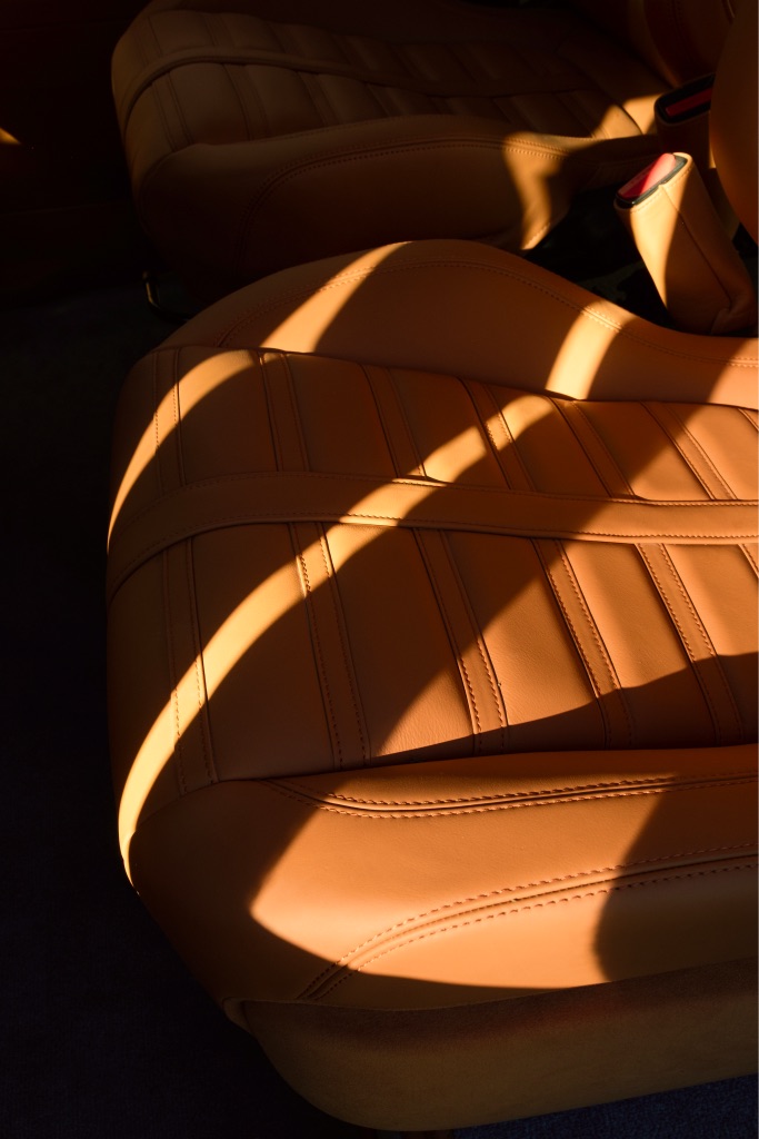 Defender LS tan leather seats in low sunlight